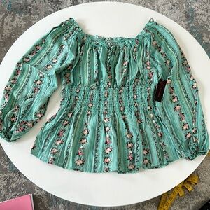 Juniors long sleeve floral top